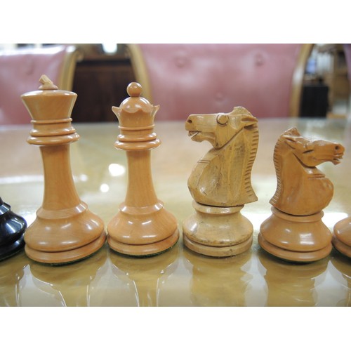 348 - Staunton pattern ebonised and boxwood chess set in later box, together with a large folding games bo... 