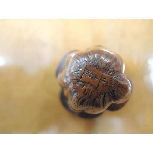 266 - Antique Japanese boxwood netsuke in the form of toadstools, with character mark signature to base, 3... 