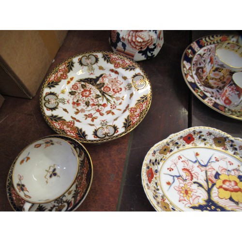 500A - Quantity of Royal Crown Derby teacups, plates, tureens etc., in various patterns including Bloor Der... 