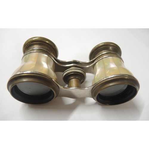 147 - Pair of brass and mother of pearl opera glasses together with a pair of Paris Jockey Club glasses