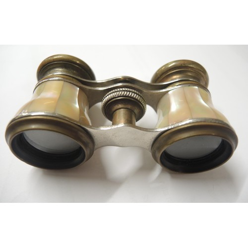 147 - Pair of brass and mother of pearl opera glasses together with a pair of Paris Jockey Club glasses