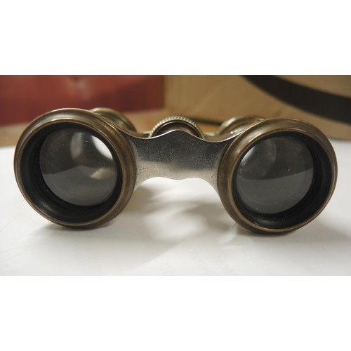 147 - Pair of brass and mother of pearl opera glasses together with a pair of Paris Jockey Club glasses