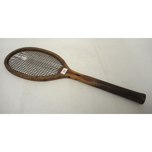 Early Triumph wooden tennis racket (at fault)