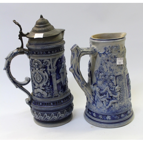 737 - Two Vass Develd German stoneware jugs, one with pewter cover, the tallest 29cm high