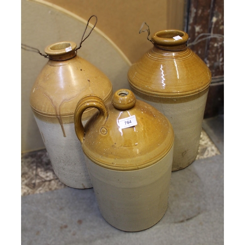 764 - Stoneware tap jar, inscribed ' Taylor's patent, Brailes, Banbury ' and two large stoneware flagons