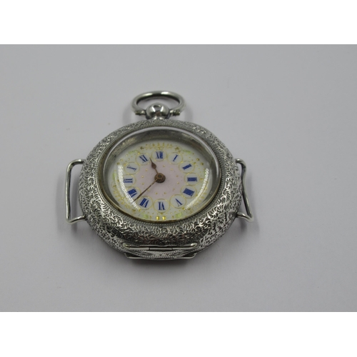 1032 - Ladies silver cased Continental pocket/wristwatch having gilt porcelain dial with Roman numerals