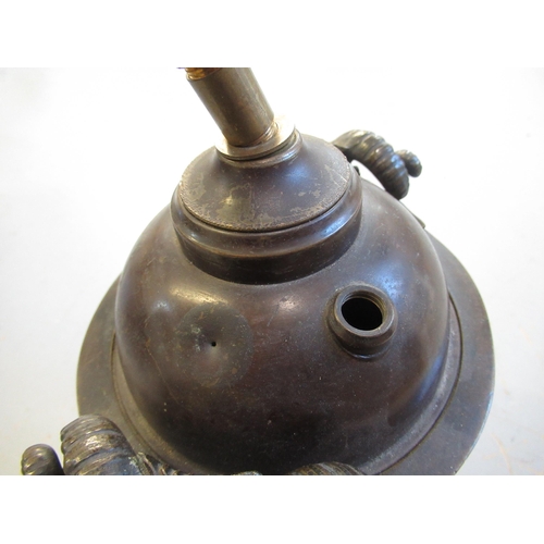 1487 - 19th Century bronze oil lamp base, after a design by Clodion, the mask head side handles above relie... 