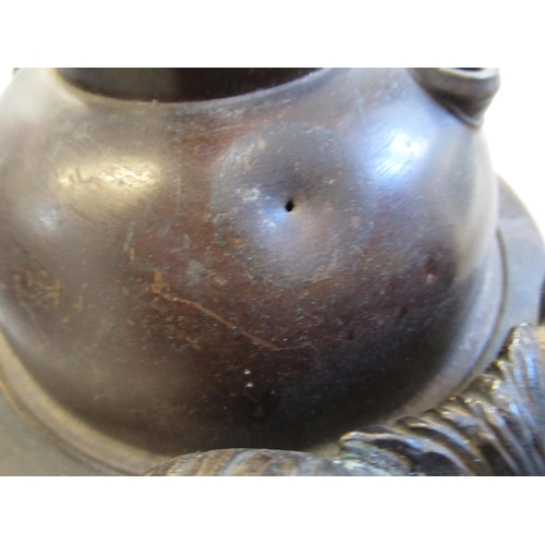 1487 - 19th Century bronze oil lamp base, after a design by Clodion, the mask head side handles above relie... 