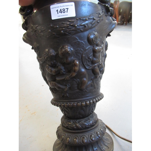 1487 - 19th Century bronze oil lamp base, after a design by Clodion, the mask head side handles above relie... 