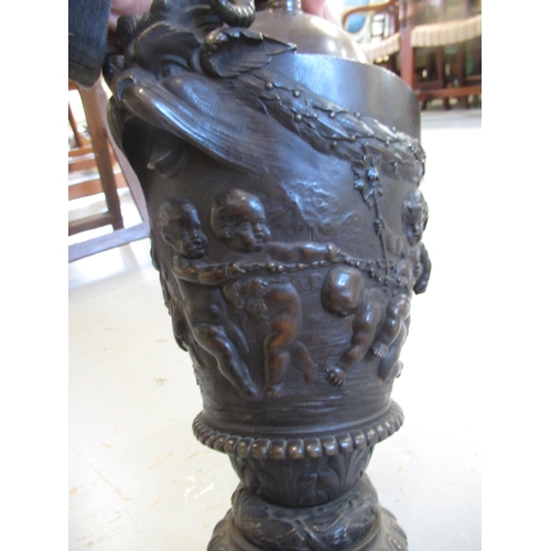 1487 - 19th Century bronze oil lamp base, after a design by Clodion, the mask head side handles above relie... 