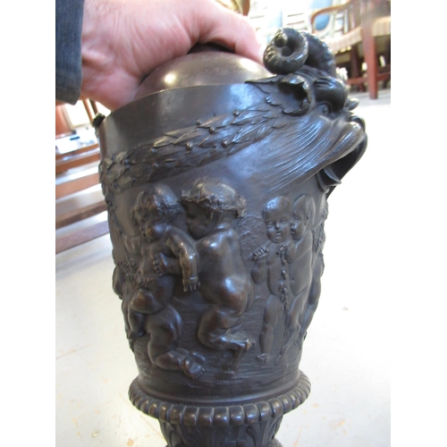 1487 - 19th Century bronze oil lamp base, after a design by Clodion, the mask head side handles above relie... 