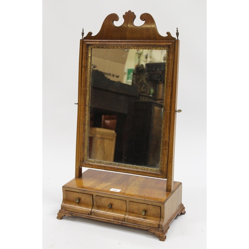 1587 - 18th Century walnut box toilet mirror with three shaped drawers, raised on bracket feet