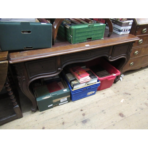 1601 - 19th Century French mahogany writing table with an inset top above three drawers raised on cabriole ... 