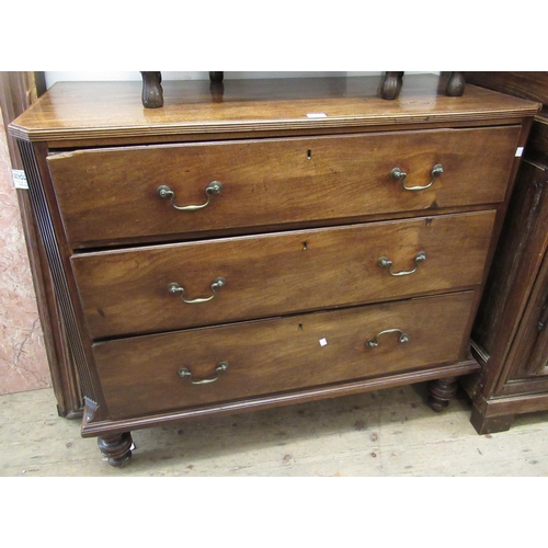 1631 - 19th Century mahogany three drawer chest having brass swan neck handles, with canted reeded corners ... 