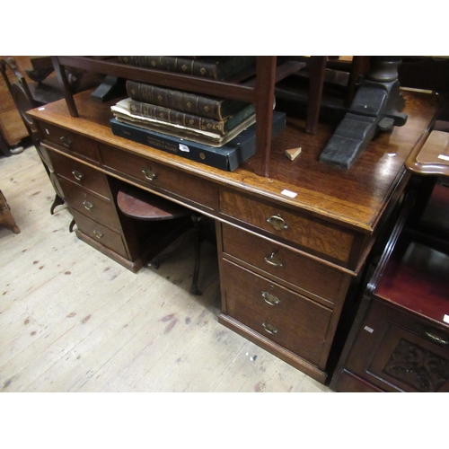 1638 - Early to mid 20th Century oak twin pedestal partners desk, the moulded top above an arrangement of v... 