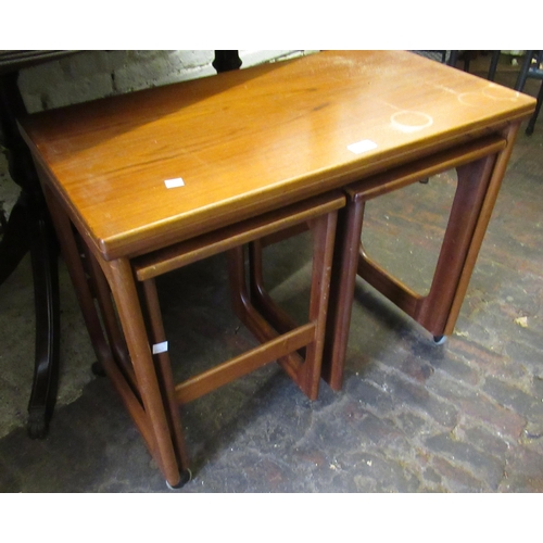 1674 - Mid 20th Century teak nest of three occasional tables by MacIntosh, together with a mid 20th teak tw... 