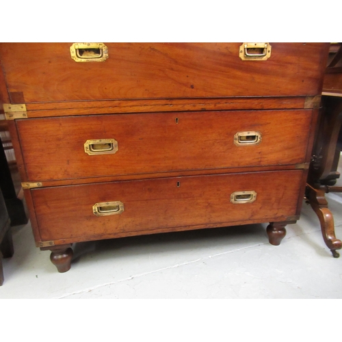 1679 - Near pair of 19th Century mahogany and brass mounted military chests of two short over three long dr... 