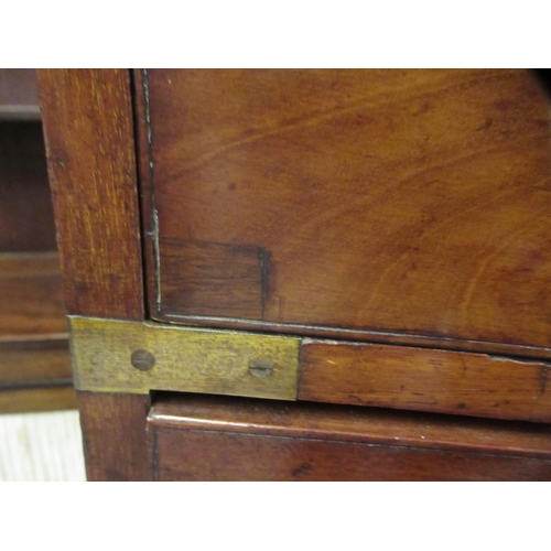 1679 - Near pair of 19th Century mahogany and brass mounted military chests of two short over three long dr... 