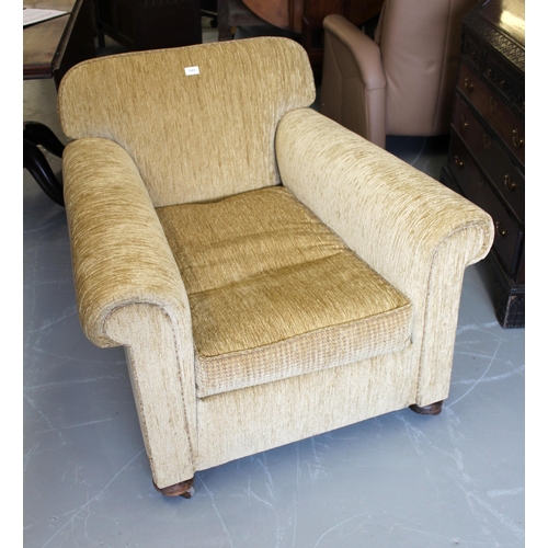 1689 - Early 20th Century green velour upholstered armchair, raised on low bun front supports