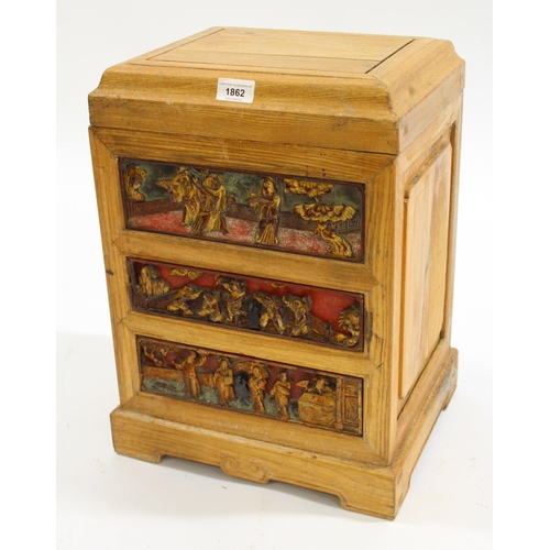 1862 - Chinese wooden table cabinet with lift-off top above two drawers, relief moulded with gilt figures, ... 