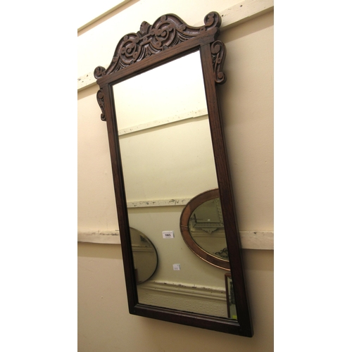 1865 - Reproduction oak wall mirror in 18th Century style with a carved pediment above a rectangular plate,... 