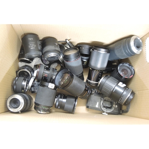 101 - Box containing a large collection of 20th Century SLR camera lenses including Canon, Praktica, Penta... 