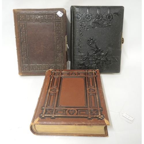 117 - Good quality embossed leather bound photograph album, together with two others similar (at fault)