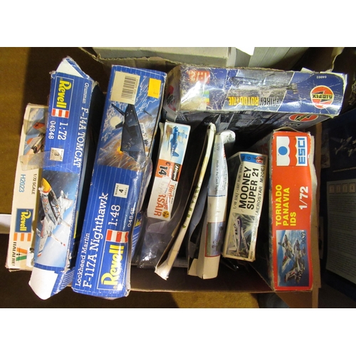 125 - Four boxes of unmade plastic aircraft kits including Airfix, Italeri, Frog and Revell