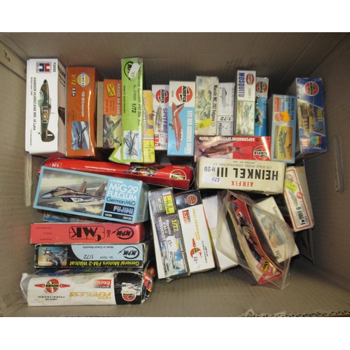 129 - Four boxes of unmade plastic aircraft kits including Airfix, Italeri, Frog and Revell (some bagged)