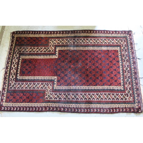 13 - Afghan prayer rug, with multiple borders on wine ground, 132 x 85cm