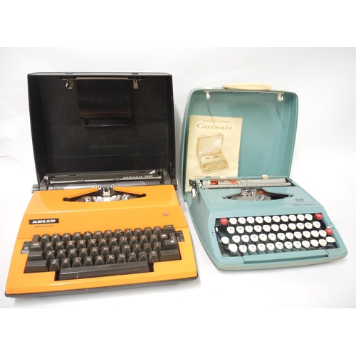 138 - Smith Corona Corsair typewriter in case and another Adler Netherlands typewriter in case (lacking le... 