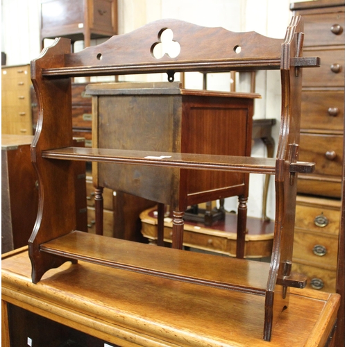 1459 - Three shelf mahogany wall bracket with pierced decoration, 66cm wide x 16cm deep x 60cm high