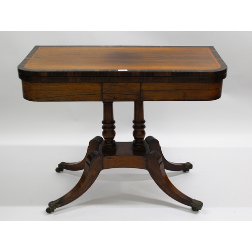 1472 - George III rosewood crossbanded card table with baize lined interior, turned column support with swe... 