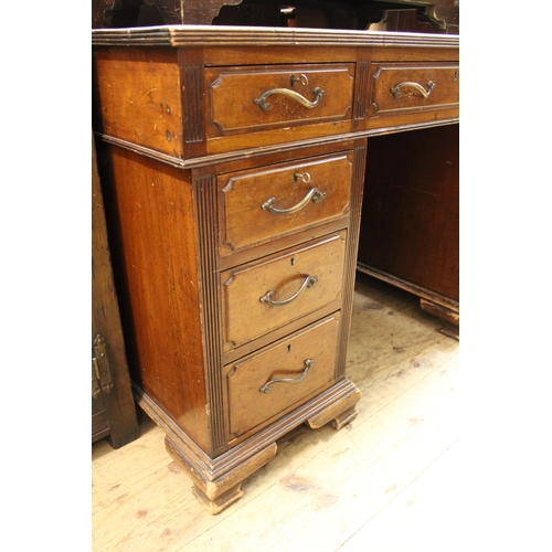 1506 - Early 20th Century mahogany twin pedestal desk with brass handles and ogee bracket feet, 122cm wide