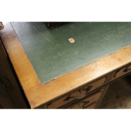 1506 - Early 20th Century mahogany twin pedestal desk with brass handles and ogee bracket feet, 122cm wide