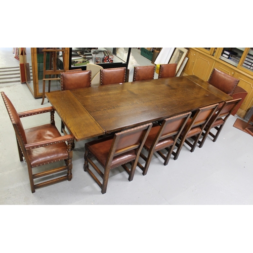 1507 - Reproduction oak dining room suite comprising:  set of ten (eight plus two) studded leather upholste... 