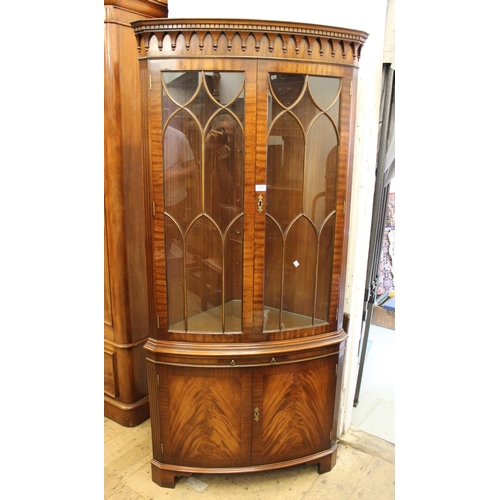 1509 - Good quality reproduction mahogany bow front standing corner cabinet (probably Bevan & Funnell), the... 