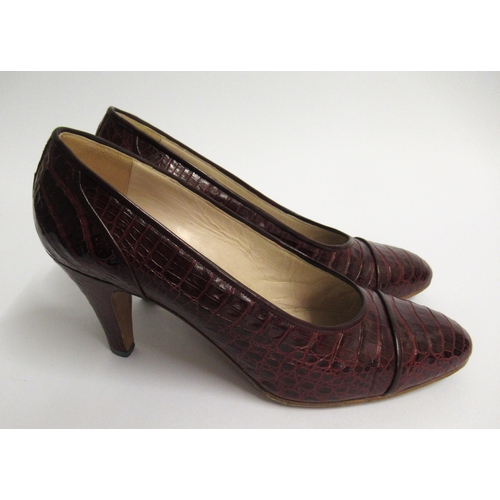 18 - Pair of ladies Chanel burgundy crocodile leather court shoes, marked size 7.5, with original box