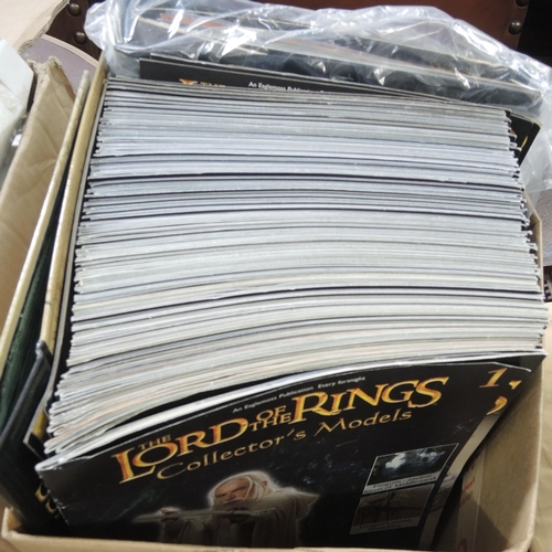 194 - Approximately two hundred boxed Eaglemoss Lord of the Rings diecast metal figures, magazines and sta... 