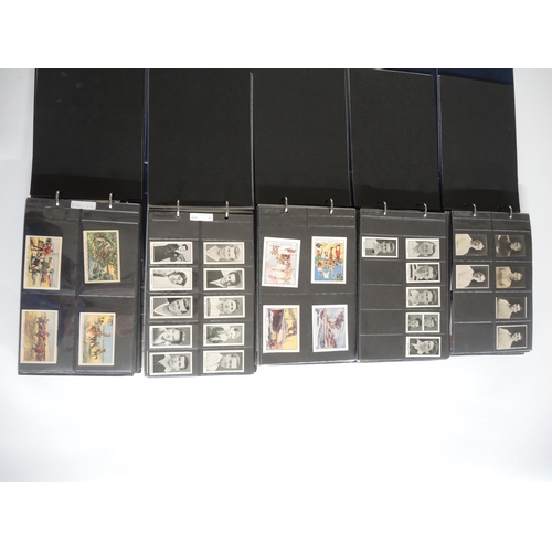 221 - Five albums containing a collection of DC Thomson trade cards including World Cup Footballers and ma... 