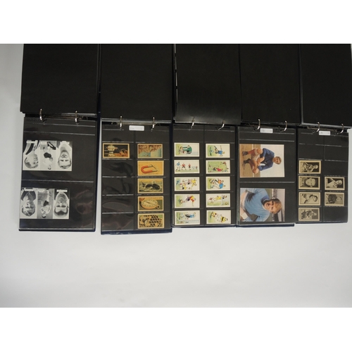 221 - Five albums containing a collection of DC Thomson trade cards including World Cup Footballers and ma... 