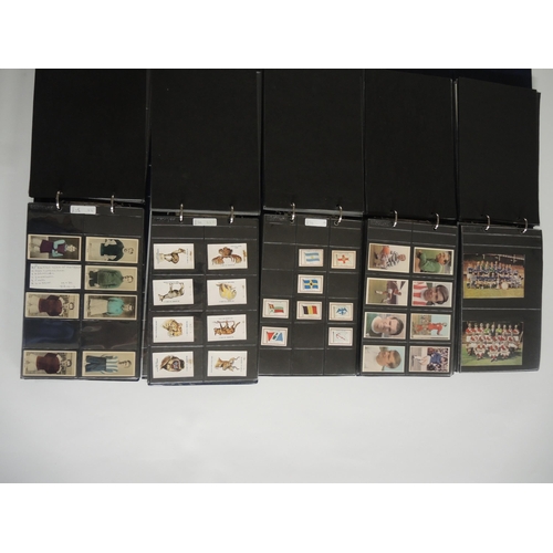 221 - Five albums containing a collection of DC Thomson trade cards including World Cup Footballers and ma... 