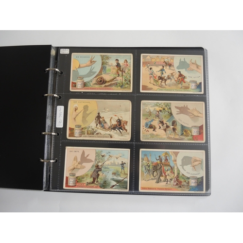 222 - Album containing thirty one sets of Liebig collectors cards