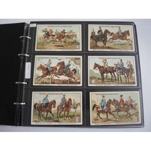 229 - Album containing thirty one sets of Liebig collectors cards