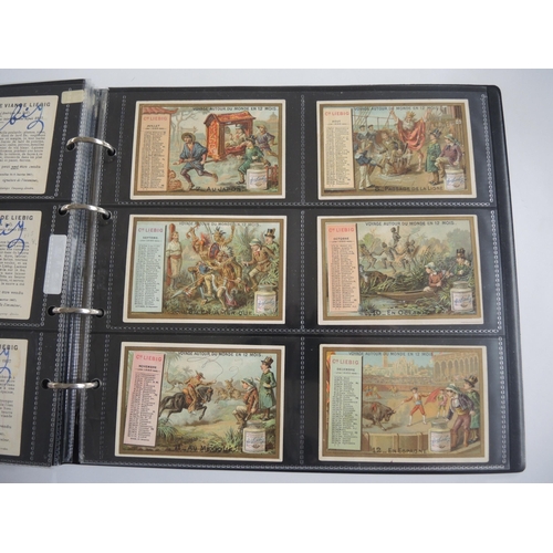 229 - Album containing thirty one sets of Liebig collectors cards