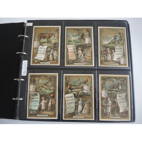 229 - Album containing thirty one sets of Liebig collectors cards