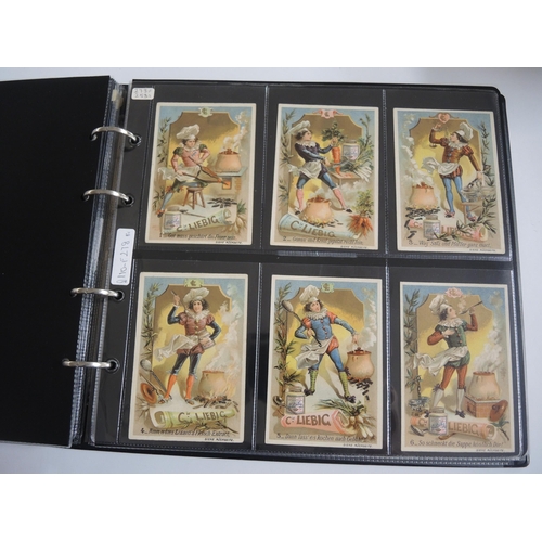 230 - Album containing thirty two sets of Liebig collectors cards