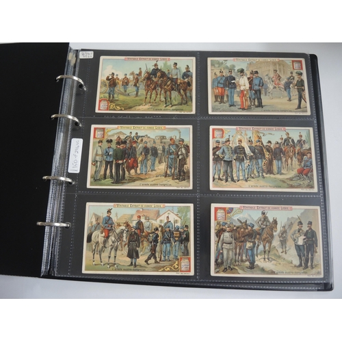 230 - Album containing thirty two sets of Liebig collectors cards