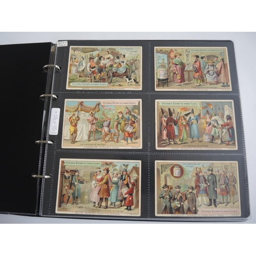 231 - Album containing thirty two sets of Liebig collectors cards