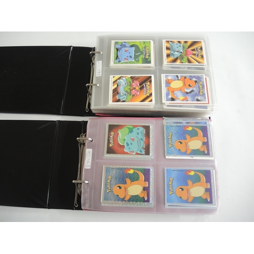 232 - Two albums containing Pokemon Boomer Super Bubble Gum trading cards, 1995 - 2001 including Holo's, t... 